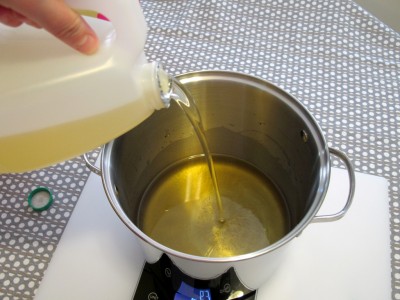 measure liquid oils into melted hard oils